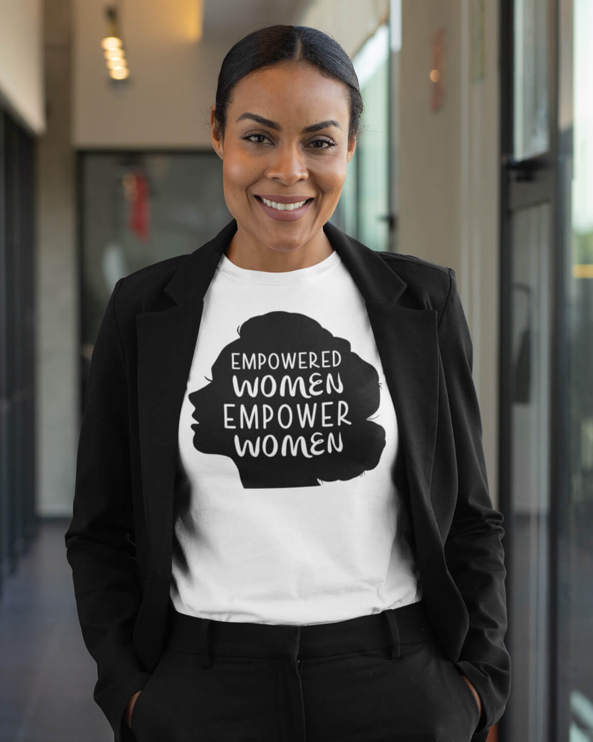 Woman wearing empowered women empower women shirt