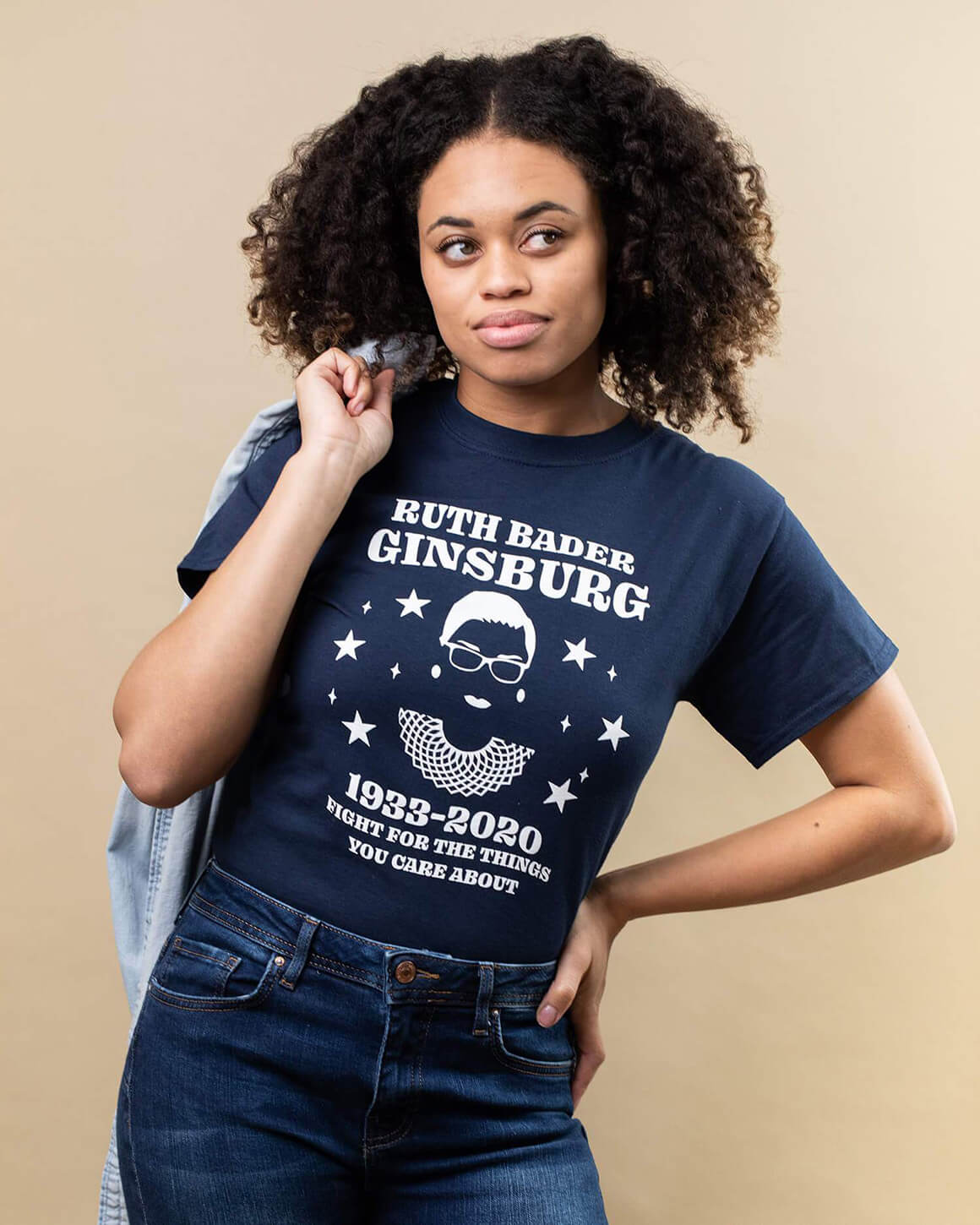 Young woman smiling wearing RBG fight for the things you care about shirt
