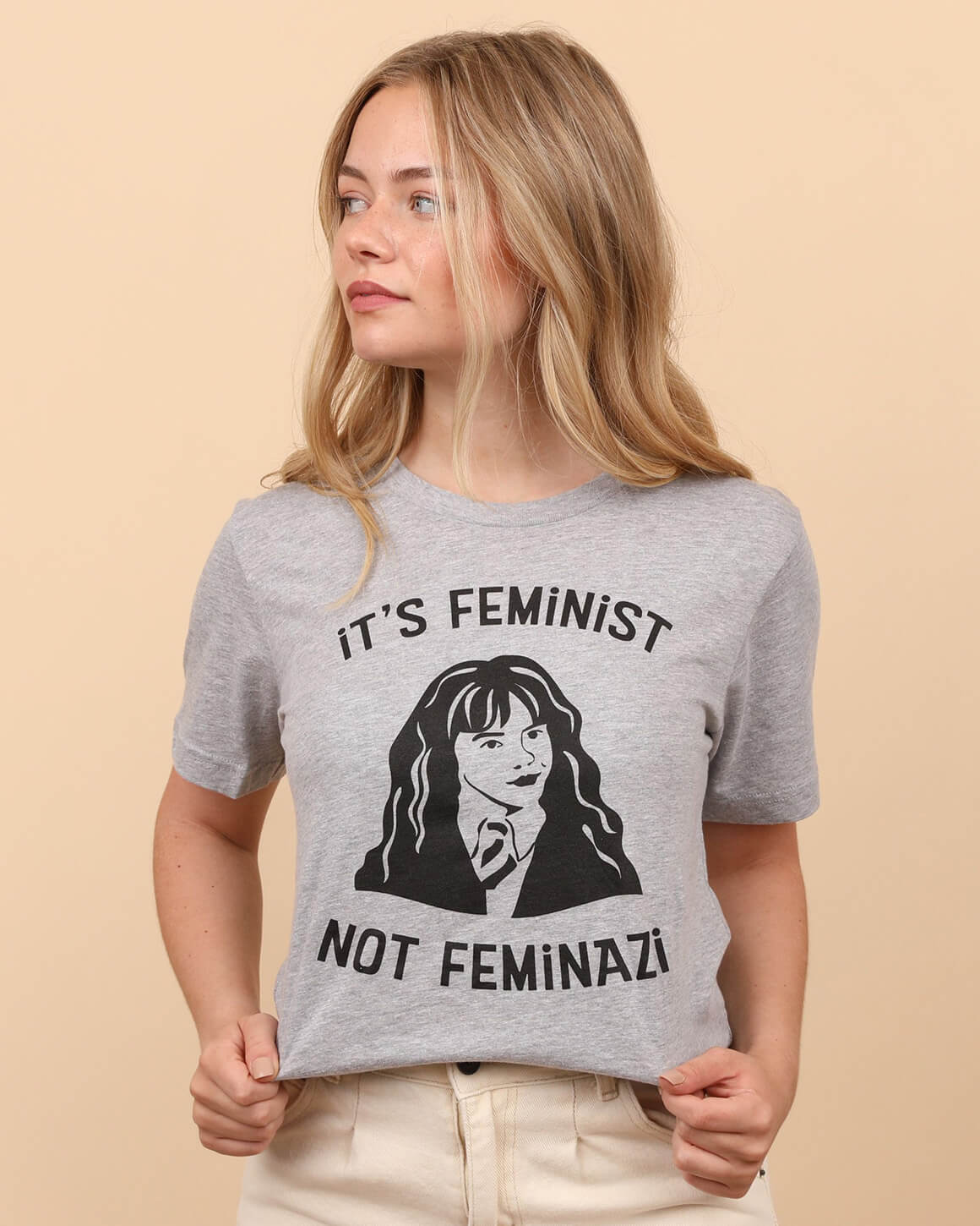 Light grey t-shirt that reads it's feminist not feminazi