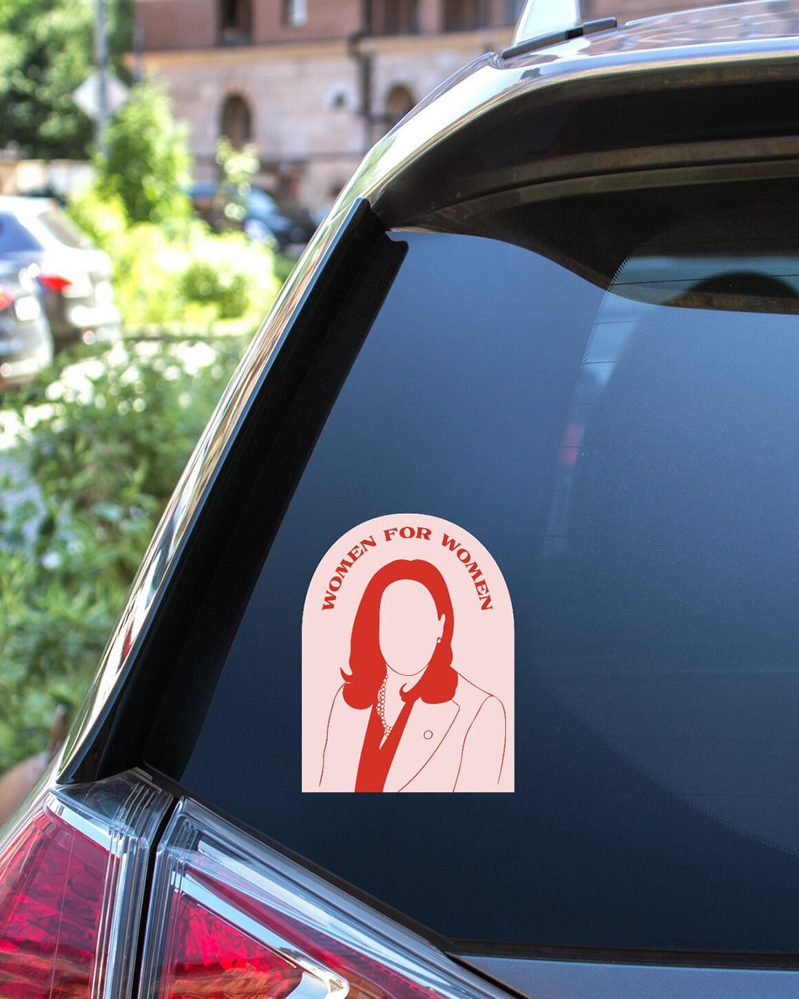 Red women for women decal on the back of an SUV