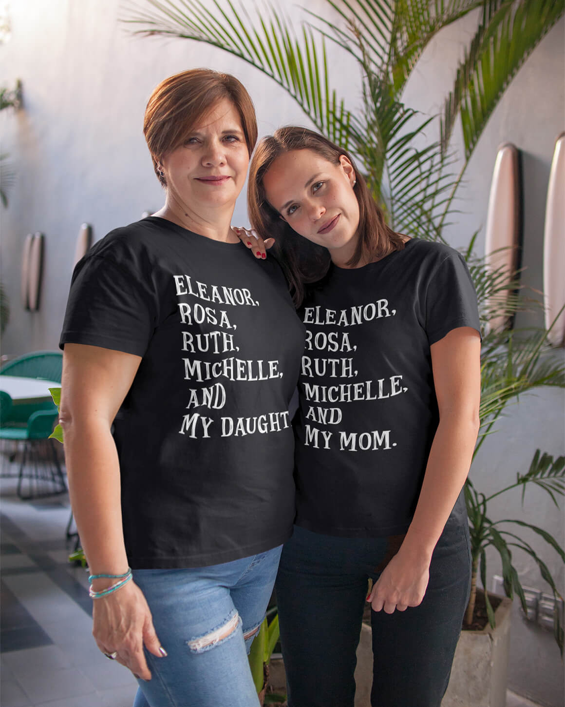 Mom and daughter wearing matching feminist name shirts