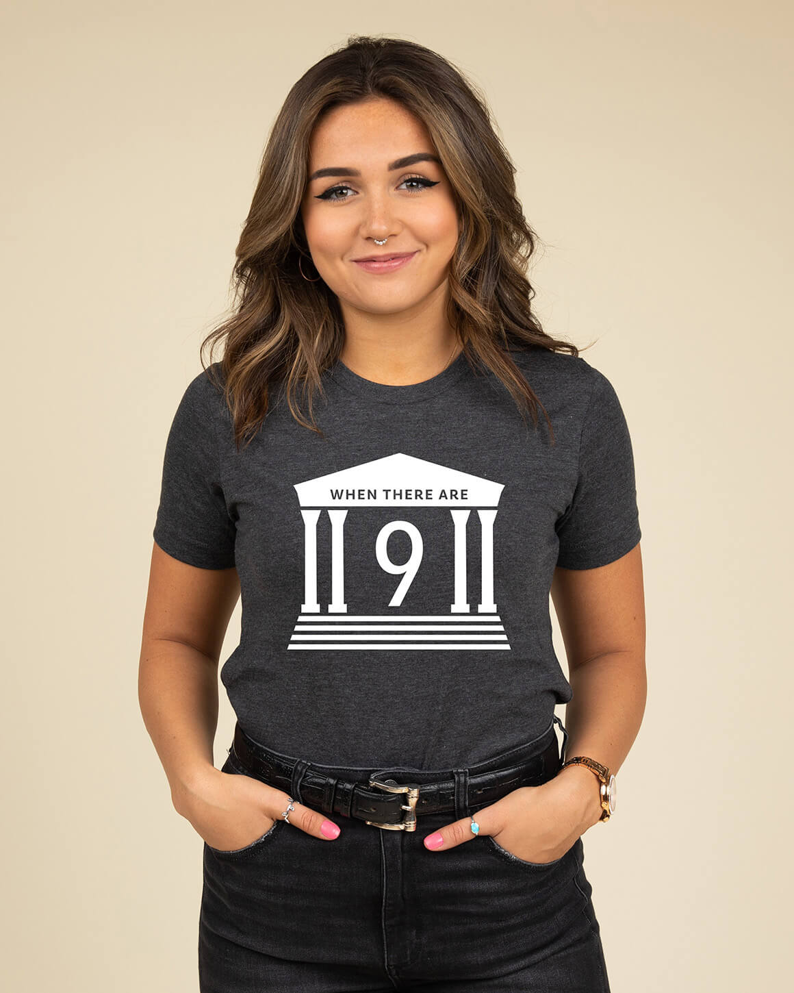 Young woman smiling and wearing gray RBG when there are nine (9) t shirt
